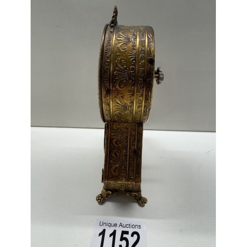 1152 - A small vintage mantle clock in an earlier style with a faux cameo panel. Rd no 872088. Height 14.5c... 