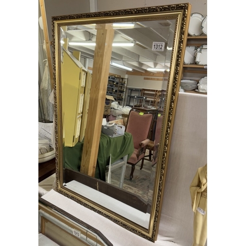 1312 - A gilt frame bevel edge mirror. 57 x 82cm