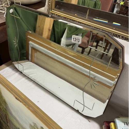 1313 - A bevel edged wall mirror