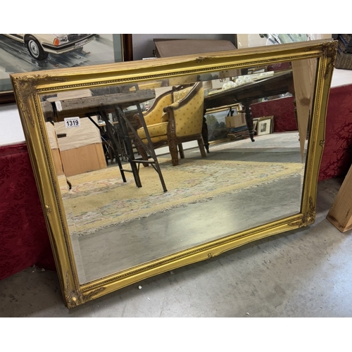 1319 - A gilt frame mirror