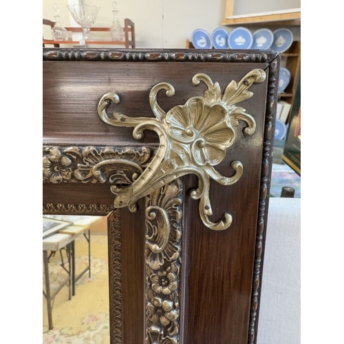 1322 - A pair of wooden framed mirrors with gilt effects