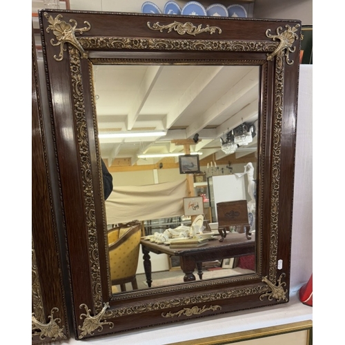 1322 - A pair of wooden framed mirrors with gilt effects