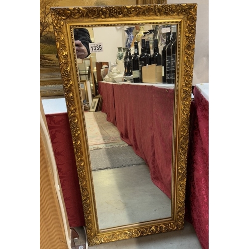 1335 - A gilt frame mirror. 39 x 80cm