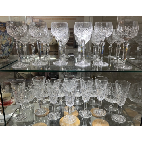 1383 - 2 Shelves of crystal etc including stemmed glasses