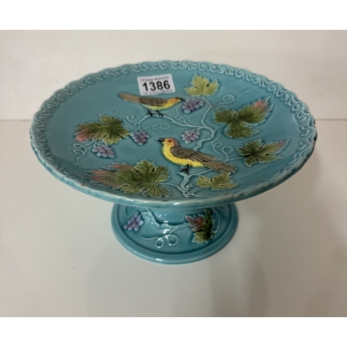 1386 - A Majolica comport / cake stand decorated with ivy & birds