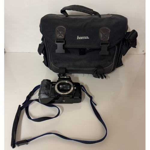 1391 - A Minolta camera with lenses & carry bag