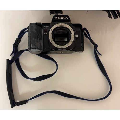 1391 - A Minolta camera with lenses & carry bag