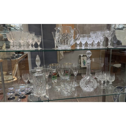 1401 - A good lot of drinking glasses (2 shelves)