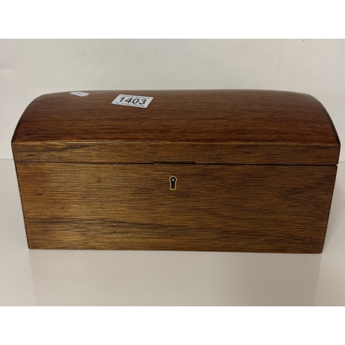 1403 - A mahogany dome top trinket / jewellery box