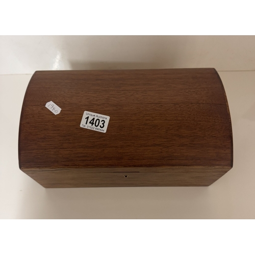 1403 - A mahogany dome top trinket / jewellery box