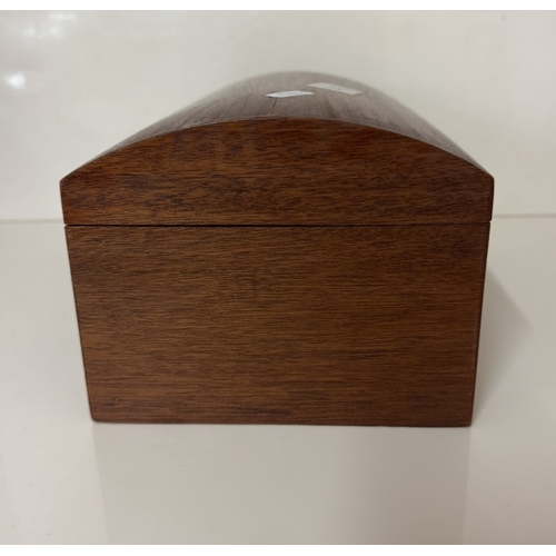 1403 - A mahogany dome top trinket / jewellery box