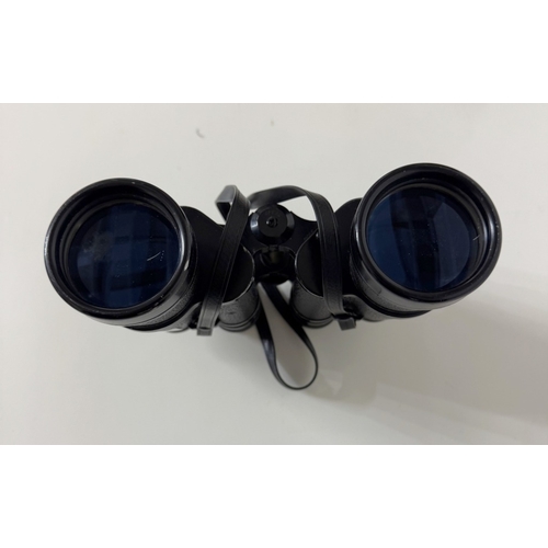 1404 - A pair of Tasco 10 x 50 field view binoculars