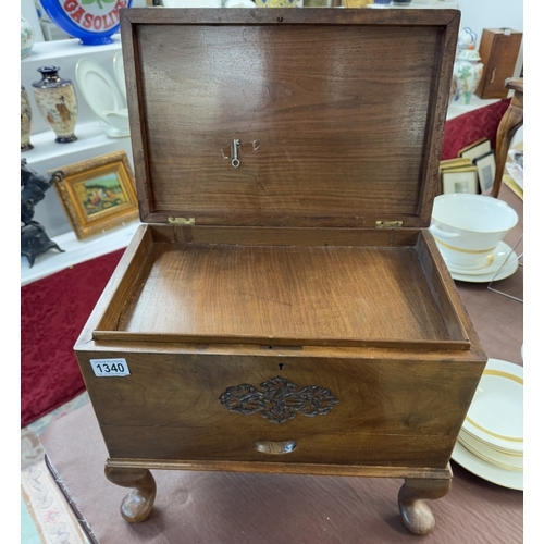 1340 - A hardwood box with carved decoration on Queen Anne legs