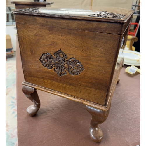 1340 - A hardwood box with carved decoration on Queen Anne legs