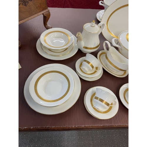 1342 - A Wedgwood Adelphi dinner service. Approximately 45 pieces