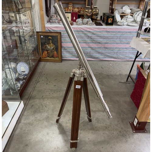 1435 - A large silver plated brass telescope on tripod stand. Length 98cm