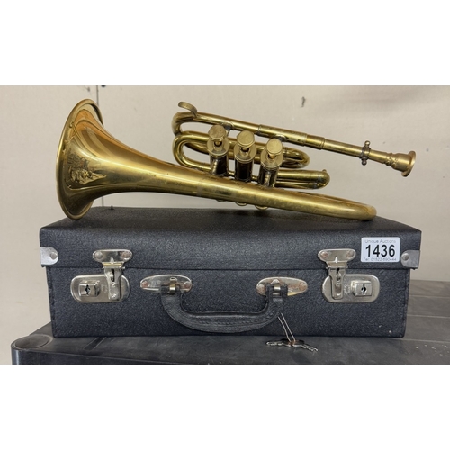 1436 - A brass trumpet with case