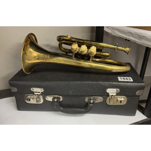 1443 - A brass trumpet with case