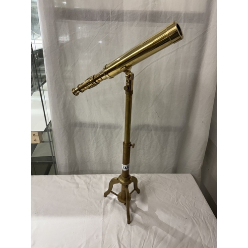 1448 - A brass telescope on tripod base