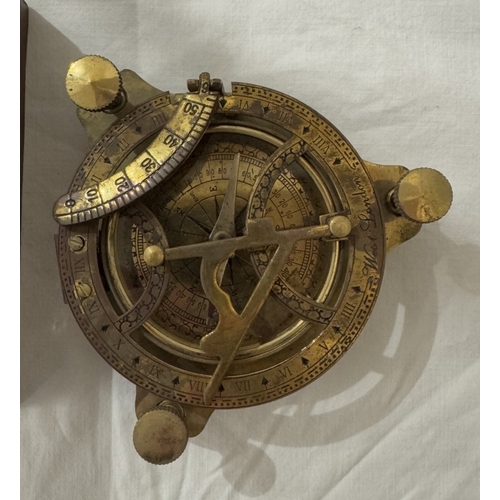 1451 - A brass multi sextant / sundial in brass bound teak box