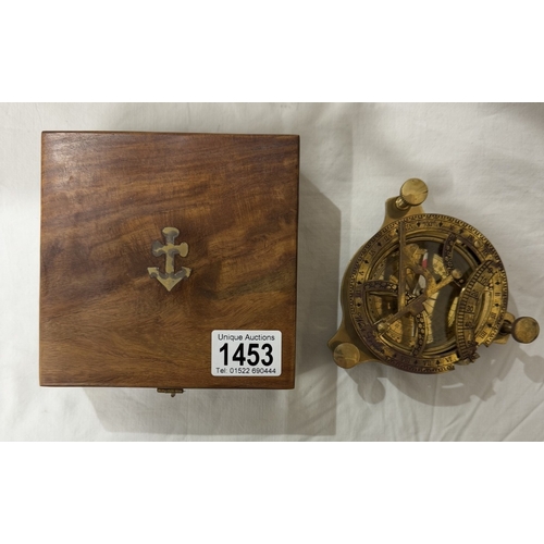 1453 - A brass multi sextant / sundial in brass bound teak box