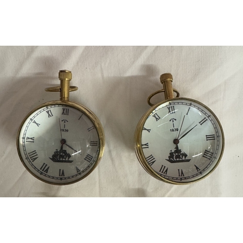 1485 - 4 Heavy brass & glass paperweight clocks with quartz movements.