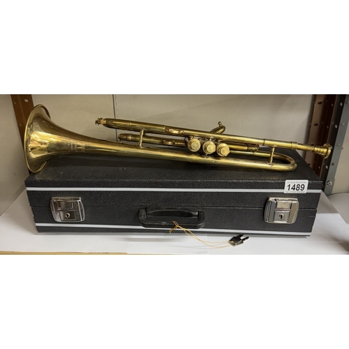 1489 - A brass trumpet with case