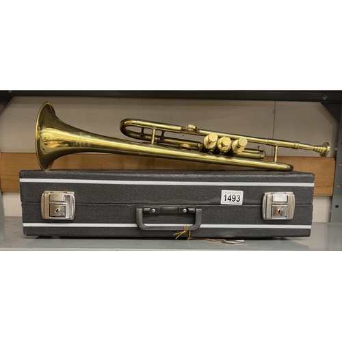 1493 - A brass trumpet with case