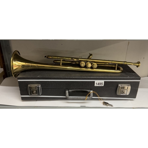 1495 - A brass trumpet with case