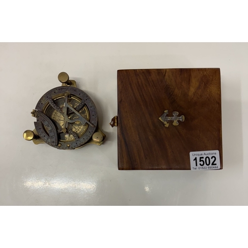 1502 - A brass multi sextant / sundial in brass bound teak box