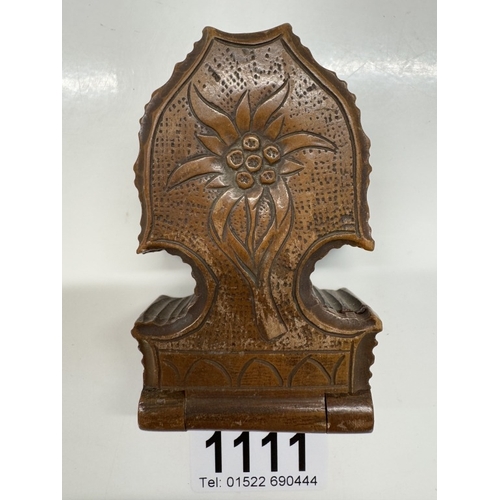 1111 - An antique carved wooden pocket watch holder