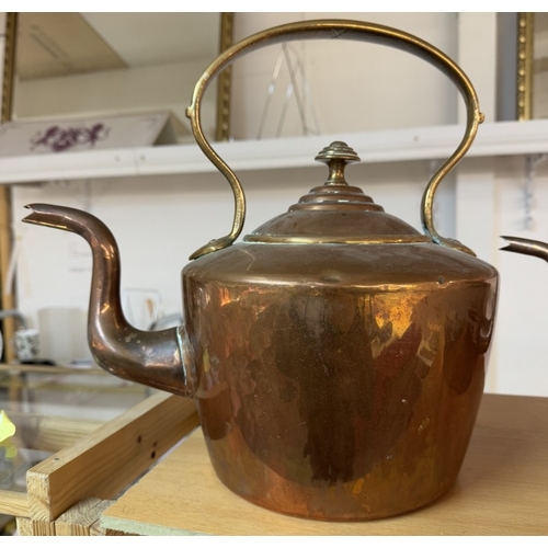 1162 - A Victorian copper kettle