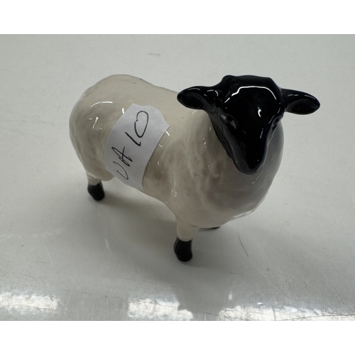 1163 - A Beswick Ram, Ewe & calf