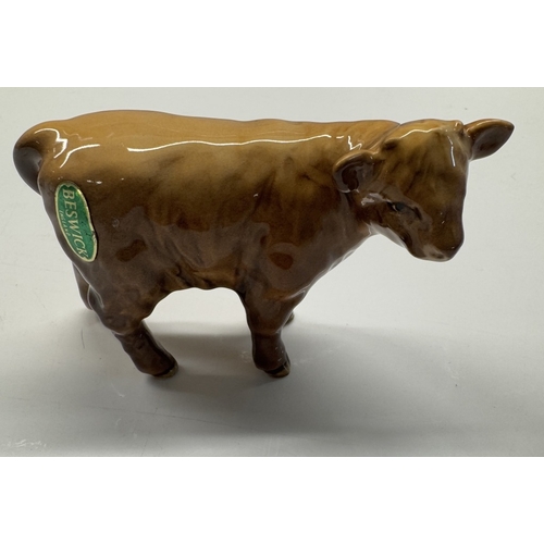 1163 - A Beswick Ram, Ewe & calf