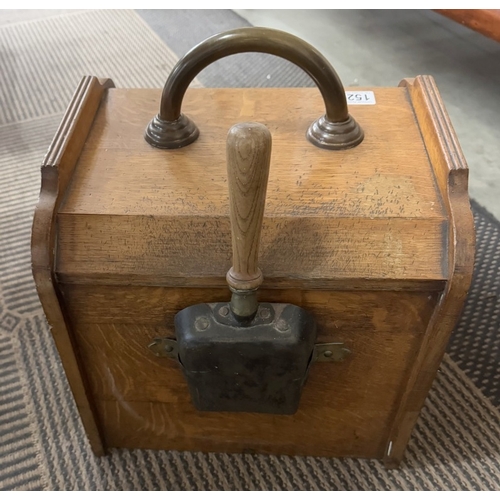 1529 - An Edwardian oak coal box with brass basket weave embellishments