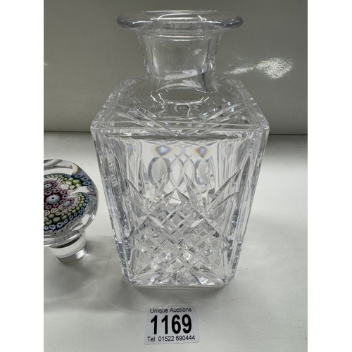 1169 - A cut glass Whitefriars decanter with Millefiori paperweight stopper dated 1977 in decoration