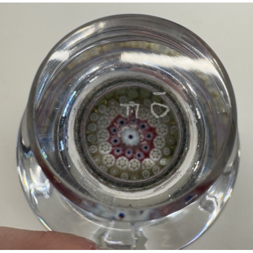 1169 - A cut glass Whitefriars decanter with Millefiori paperweight stopper dated 1977 in decoration