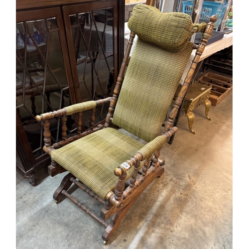 1176 - An American rocking chair with neck bolster