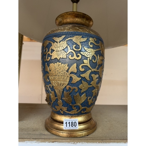 1180 - An oriental style ceramic table lamp with shade