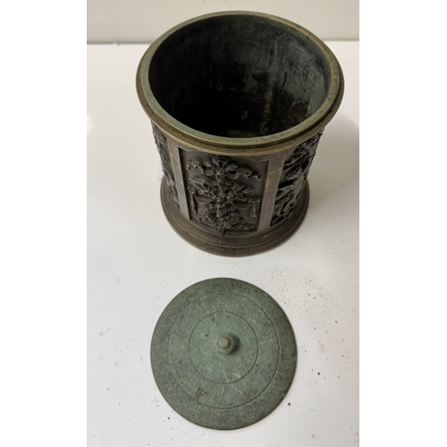 1195 - A Victorian bronze tobacco pot complete, 20cm tall