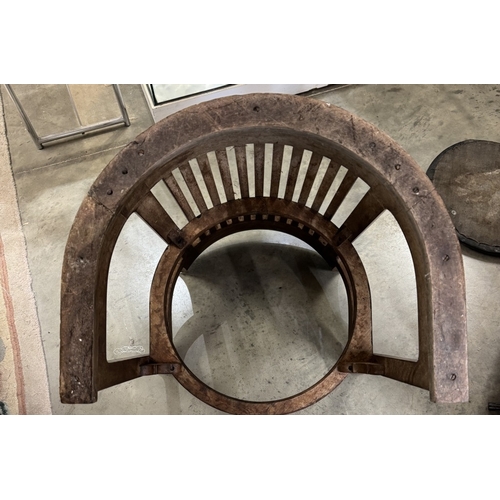 1197 - A Frank Lloyd Wright style barrel chair. Manufacturer flaw to back top right