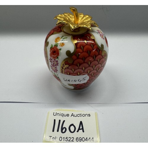 1160A - A Royal Worcester strawberry candle snuffer