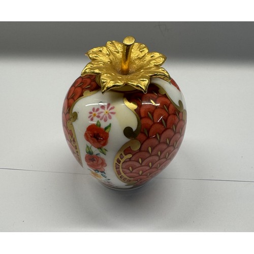 1160A - A Royal Worcester strawberry candle snuffer