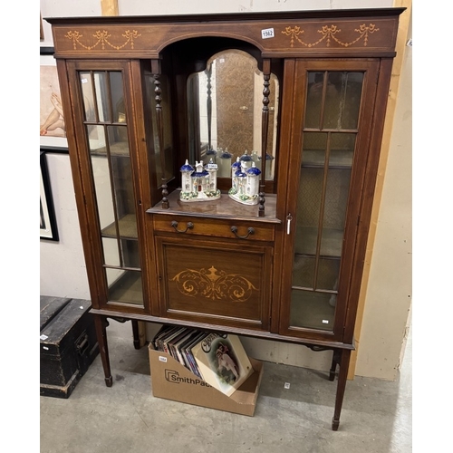 1562 - An Edwardian cabinet on cupboard base.