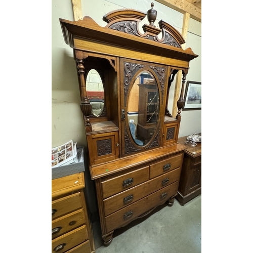 1590 - An Edwardian drawer based cabinet with mirror back.