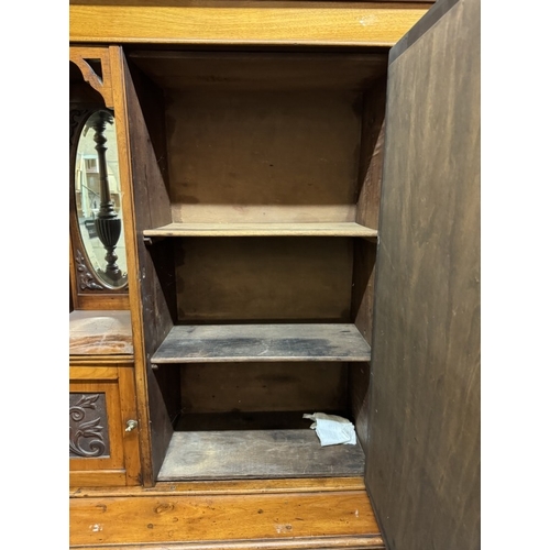 1590 - An Edwardian drawer based cabinet with mirror back.