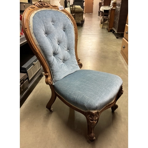 1592 - A Victorian nursing chair with blue Draylon deep buttoned back