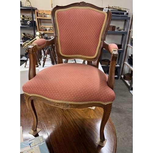 1623 - A mahogany framed elbow chair.