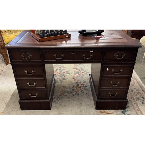 1628 - A vintage double pedestal desk in 3 parts with leather top & key