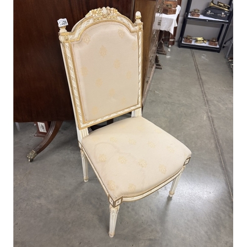 1629 - A painted white high back chair with gold painted highlights